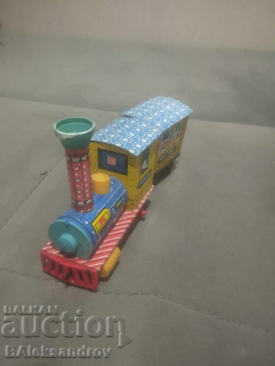 Jucărie veche mecanică din tablă cu preț 22.00 BGN | € 11.25