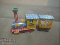 Jucărie veche mecanică din tablă