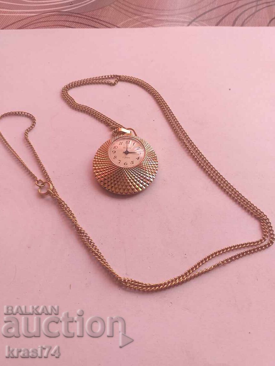 Gilt locket watch Gilt locket watch