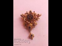 Gilded brooch