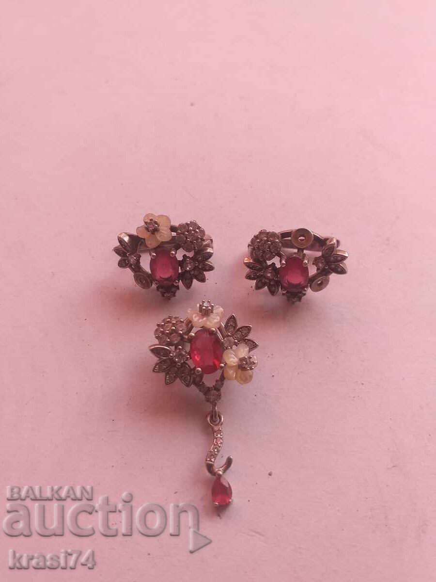 Silver earrings and pendant