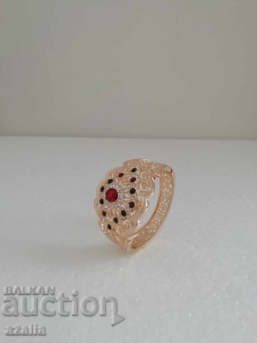 Auction Women's bracelet, gold with pebbles Auction Women's bracelet, gold with pebbles