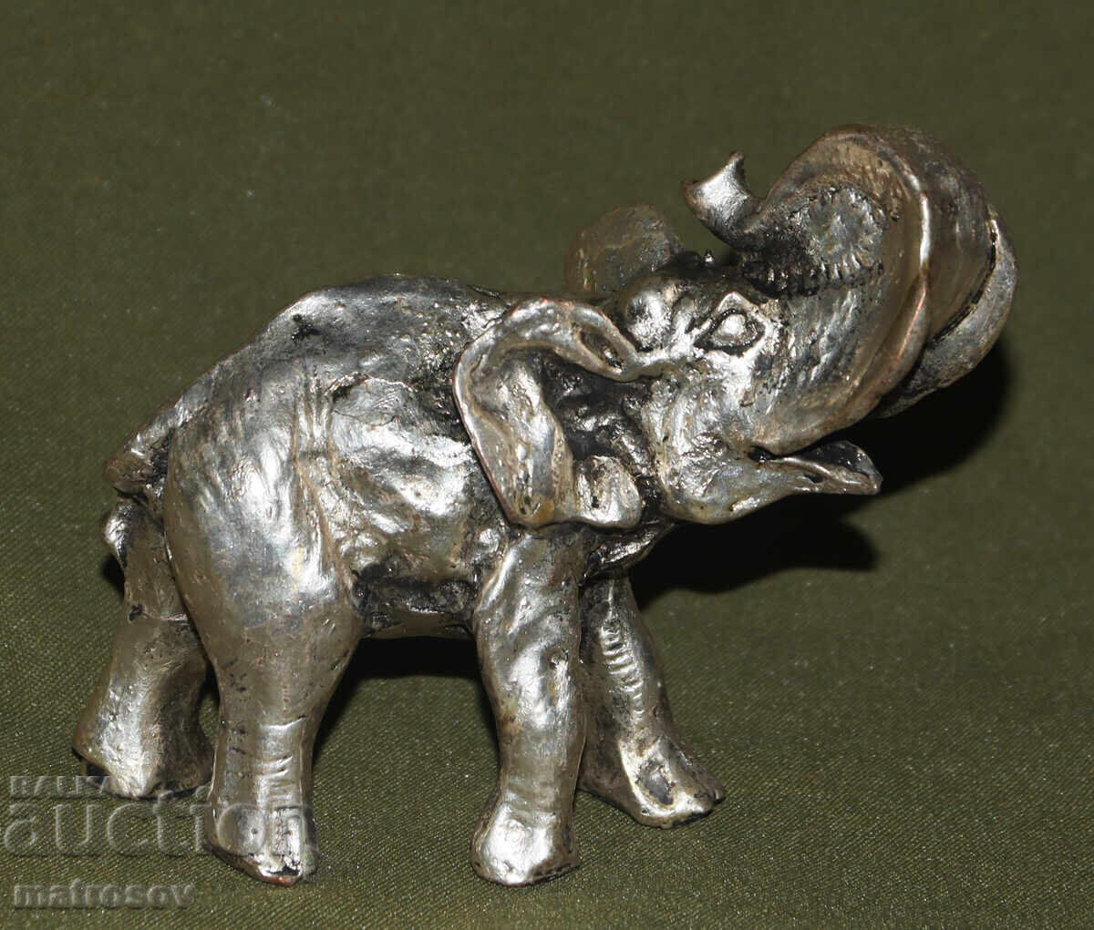 Silver-plated small decorative elephant figurine with price 120.00 BGN | € 61.36