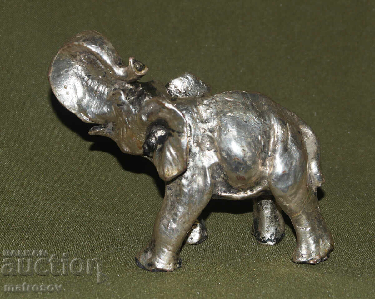 Delivery of Silver-plated small decorative elephant figurine