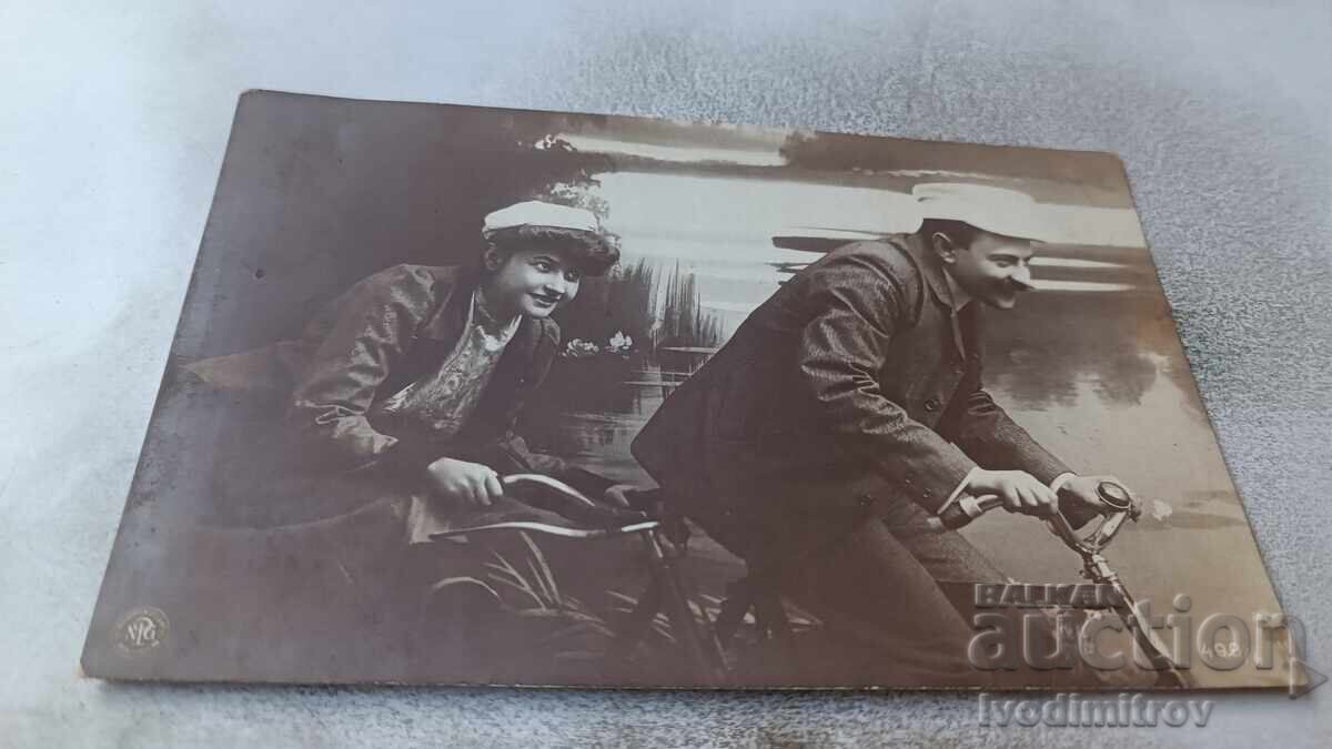 Postcard: Man and Young Girl with Retro Tandem Bicycle