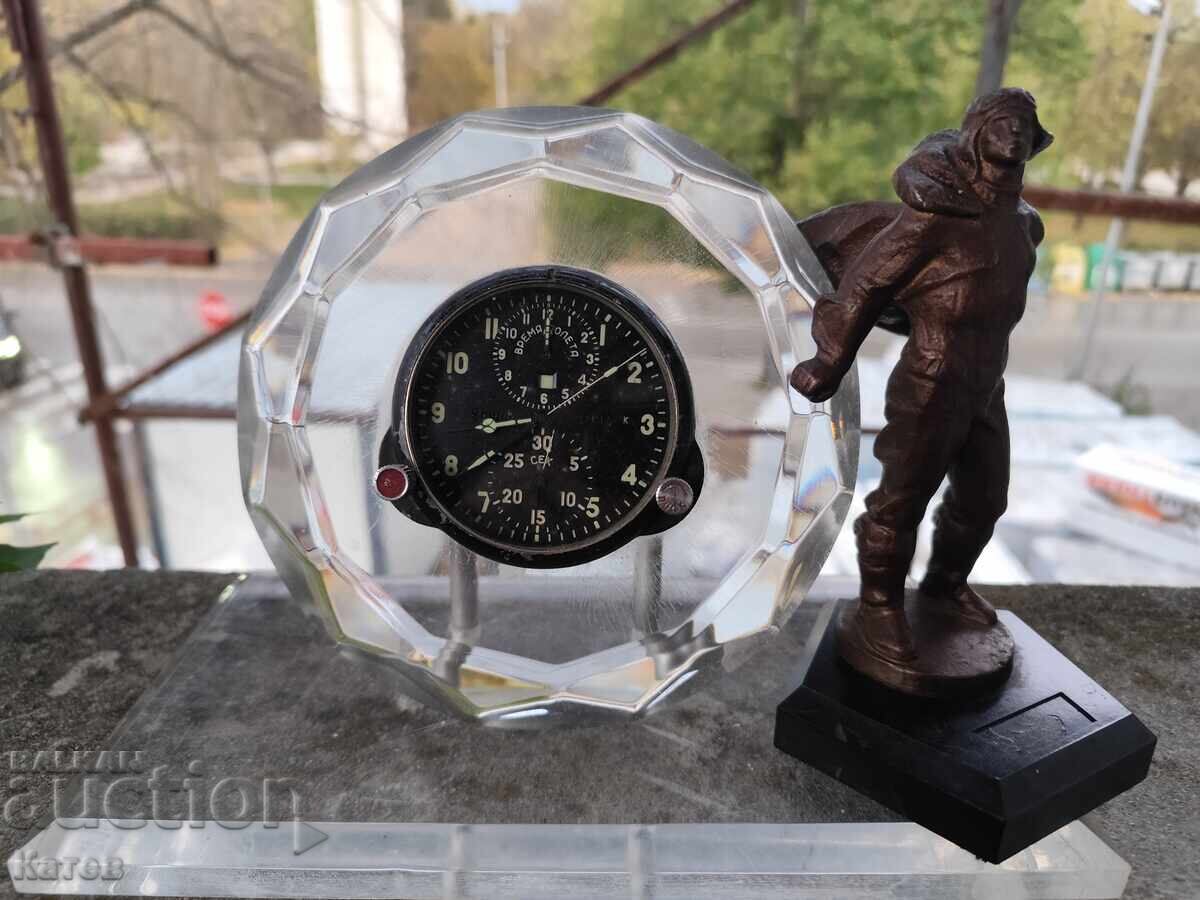 Lot of a watch from a fighter plane and a statuette of a Soviet pilot Lot of a watch from a fighter plane and a statuette of a Soviet pilot