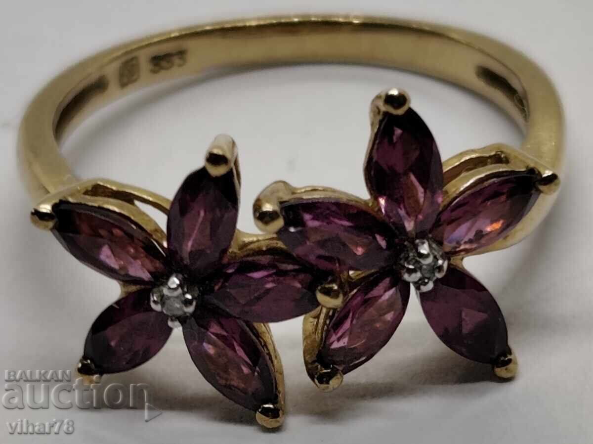 INELE DE AUR DE 8 CARATE CU GRANAT cu preț € 279.99 | 547.61 BGN