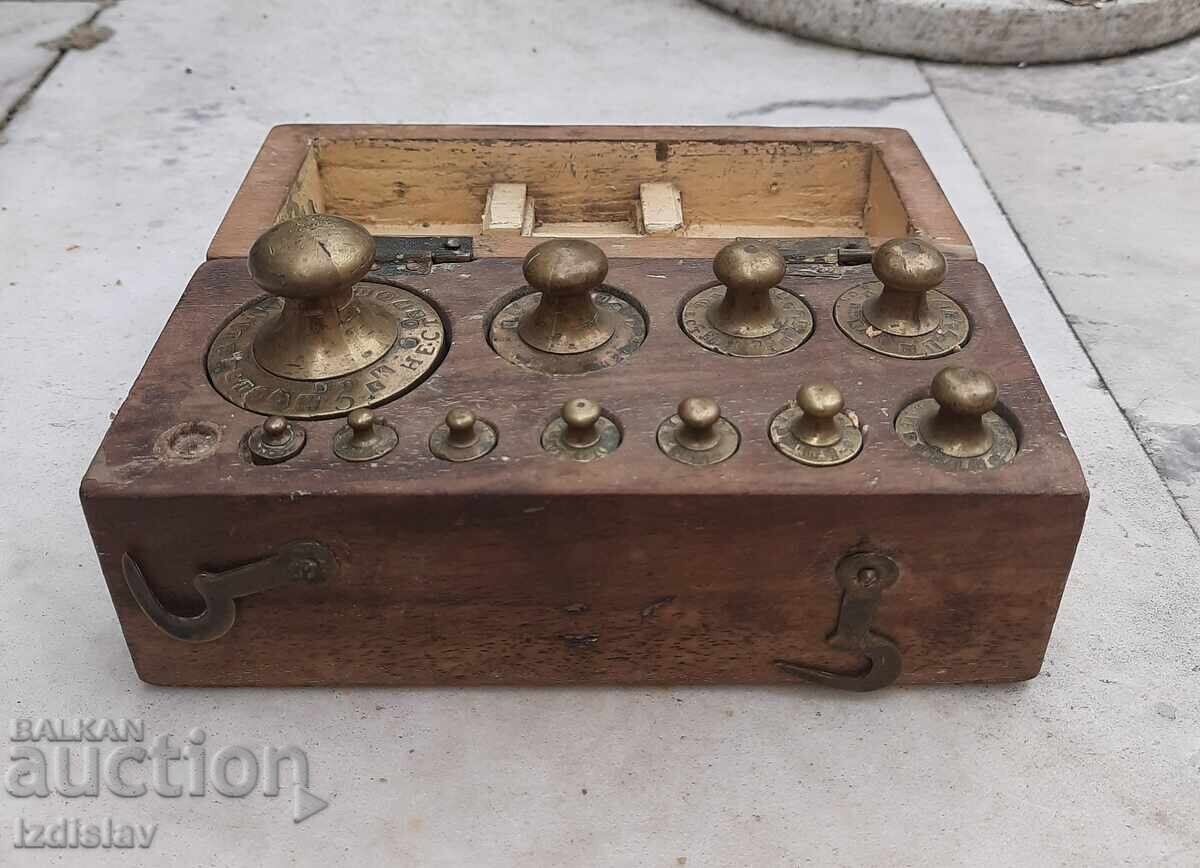 Set of old bronze weights in a wooden box with price 70.00 BGN | € 35.79 Set of old bronze weights in a wooden box with price 70.00 BGN | € 35.79
