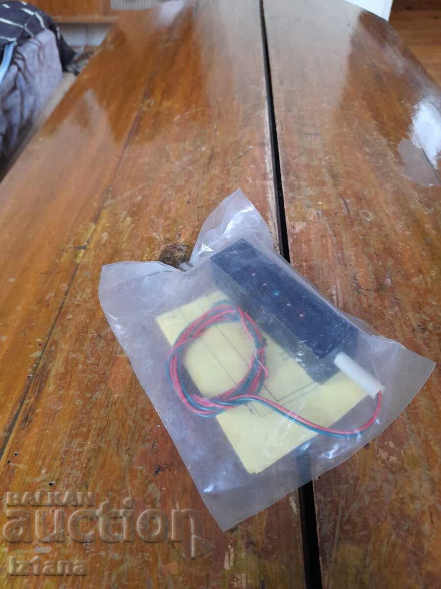 Old car voltmeter with light indication Old car voltmeter with light indication