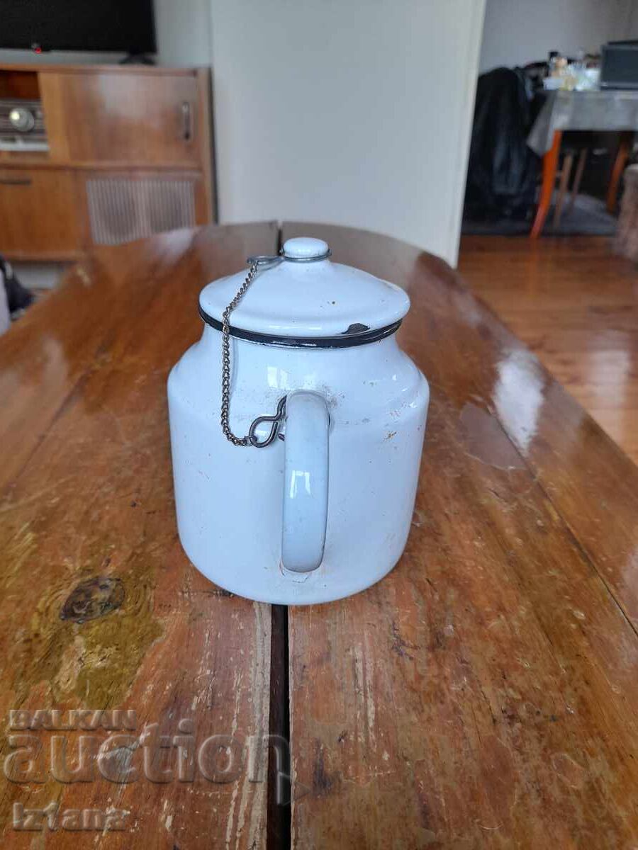 Delivery of Old enamel teapot
