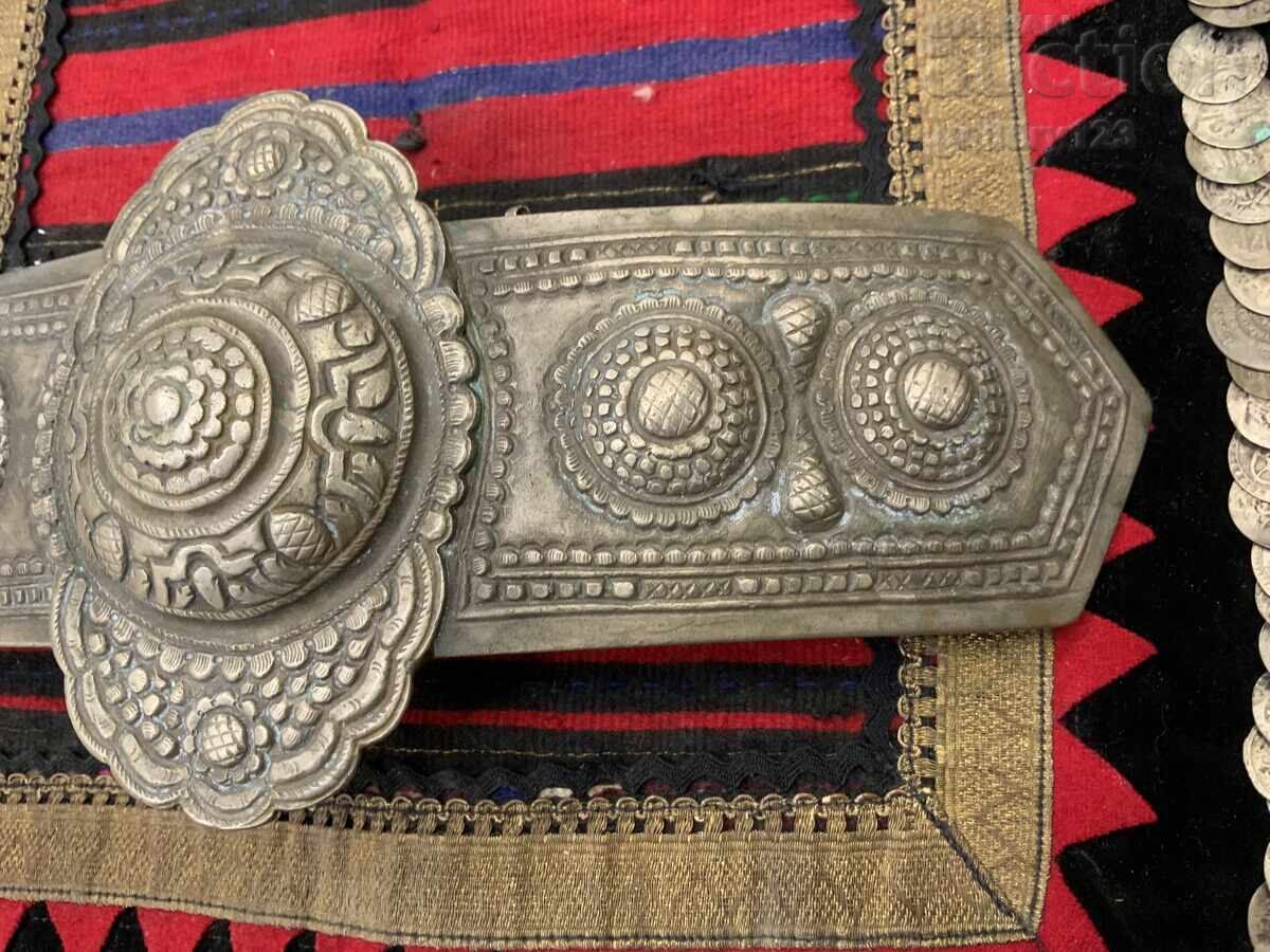 Delivery of Large Revival-era silver belt buckle, chased