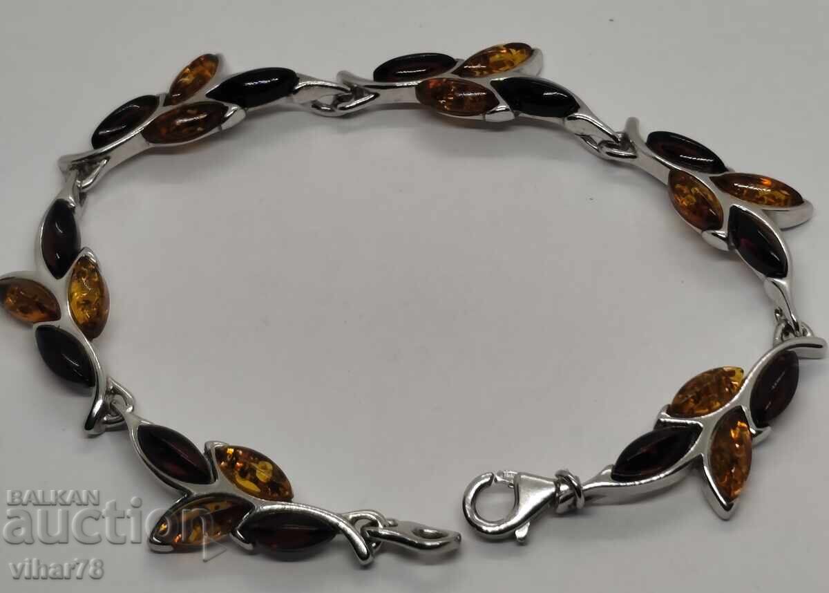 Livrarea Brățară de argint cu granat și chihlimbar