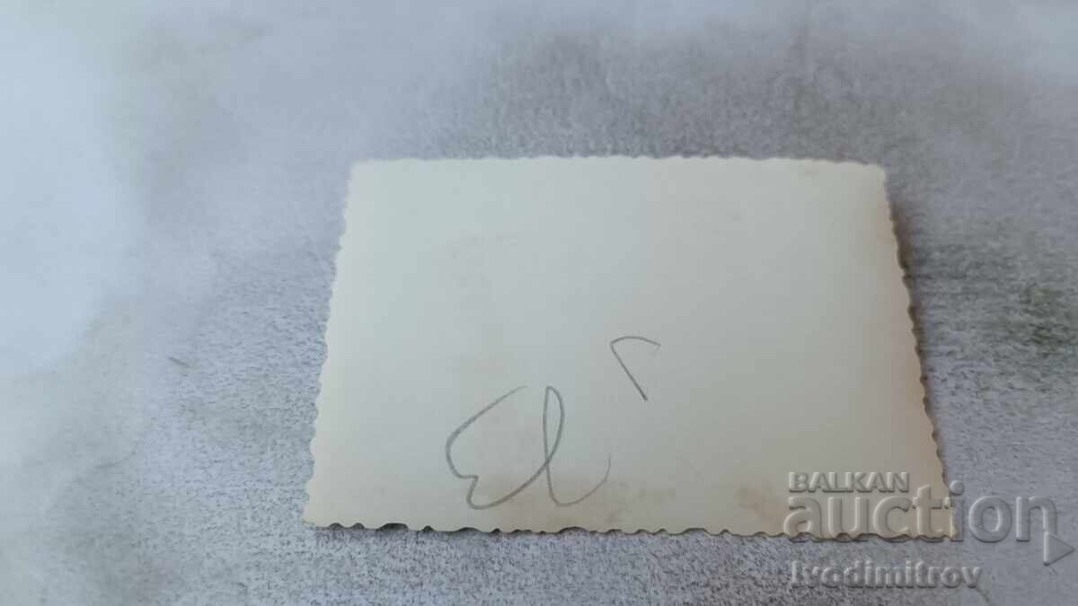 Photo Sofia Men and women with a retro Volga car on the road with price 2.35 BGN | € 1.20 Photo Sofia Men and women with a retro Volga car on the road with price 2.35 BGN | € 1.20