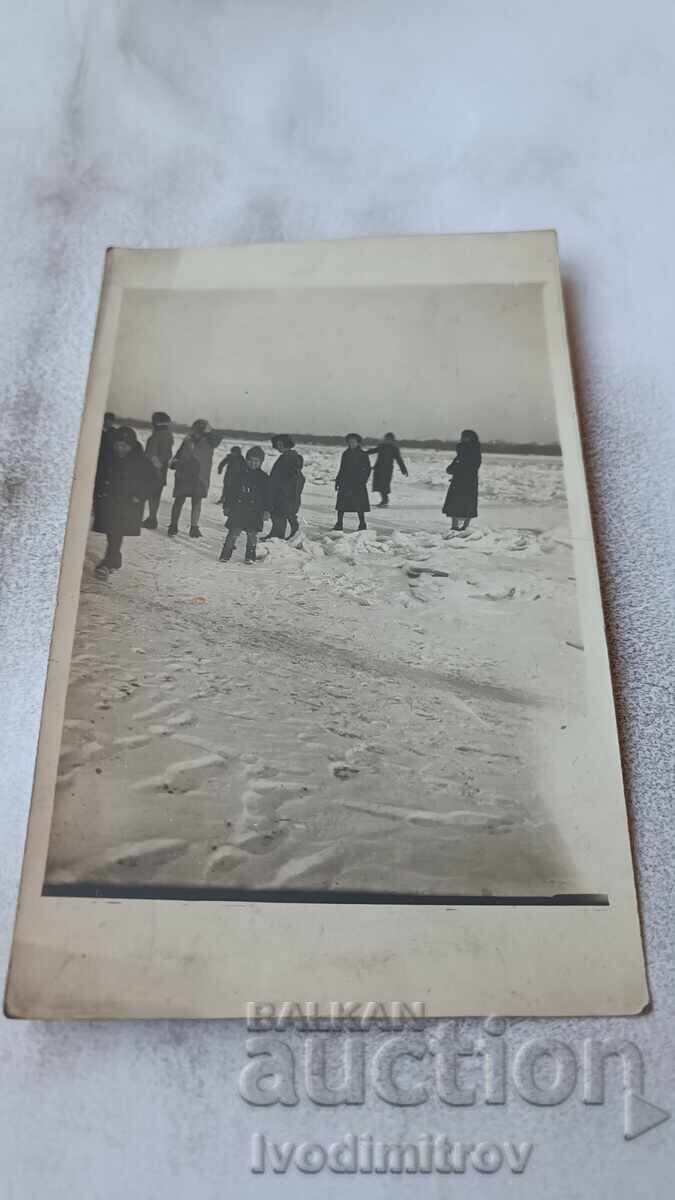 Photos of Women and Children at the Frozen Black Sea