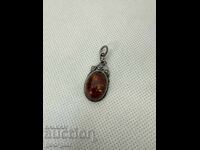Silver pendant with amber. №7535