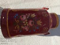 Old hand-painted milk jug