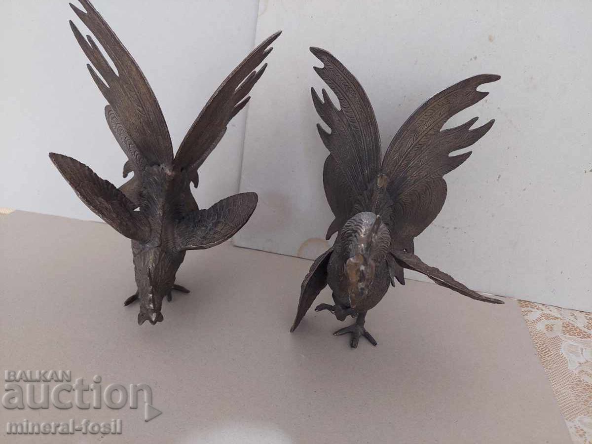 Old bronze cocks