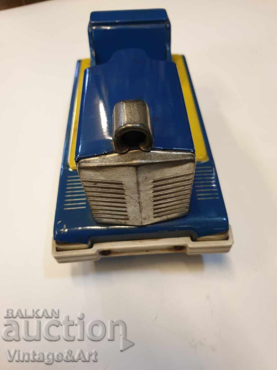 Delivery of Old Tin Toy Excavator