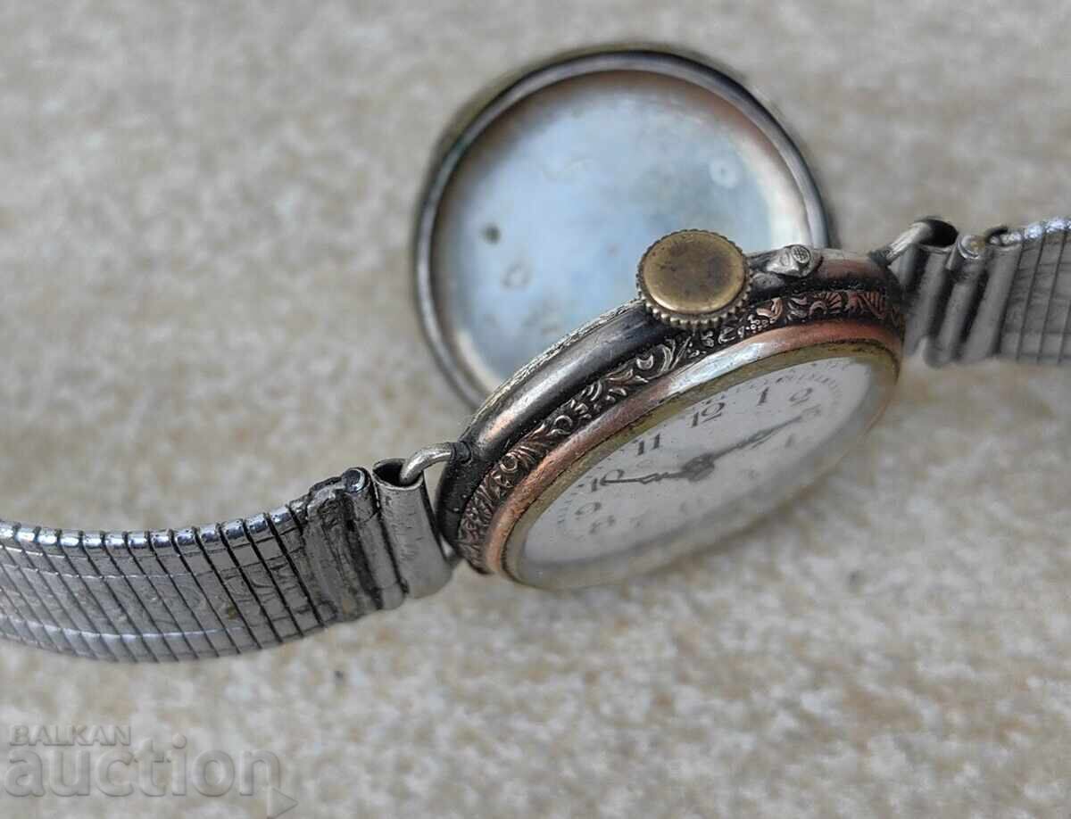 Auction  STAR SILVER LADIES WATCH. THE CHAIN IS NOT SILVER