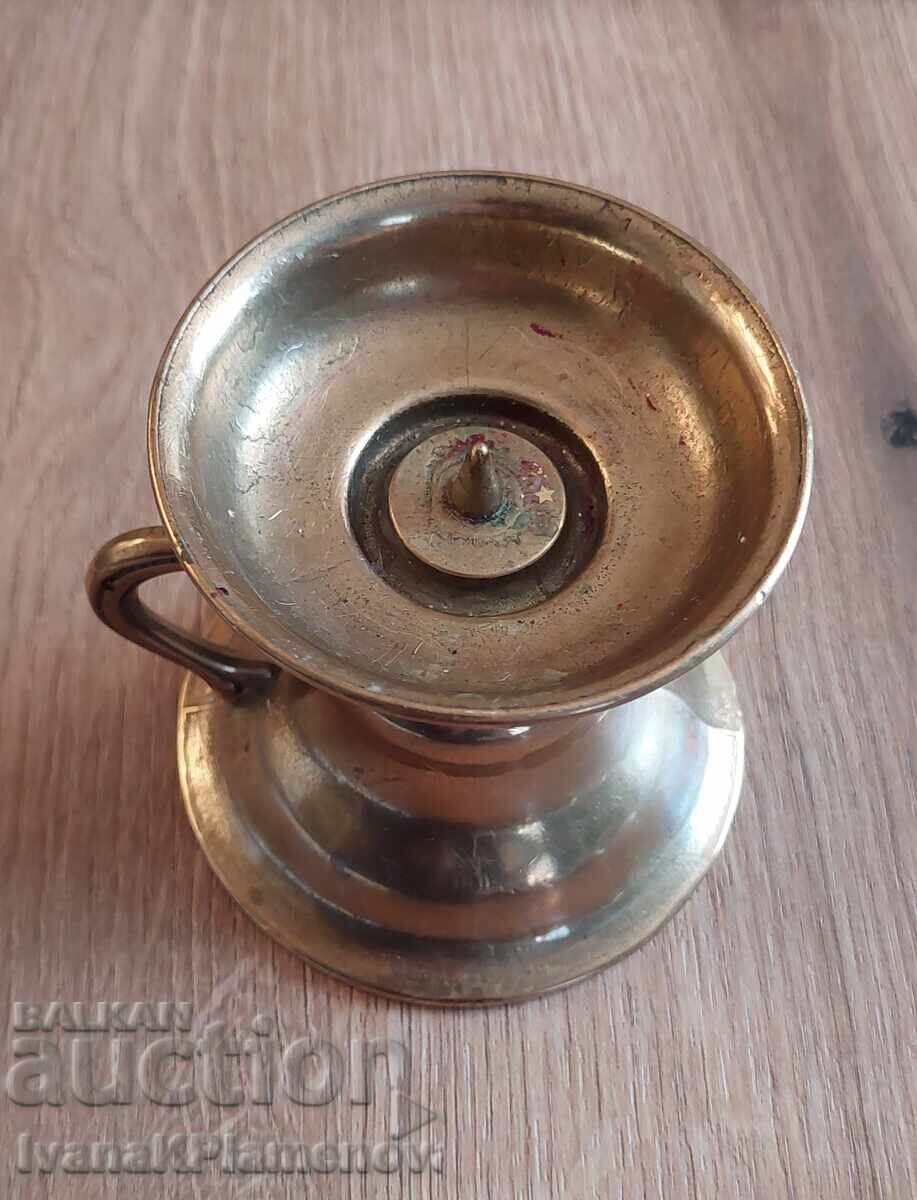 Auction  Brass candlestick for connoisseurs