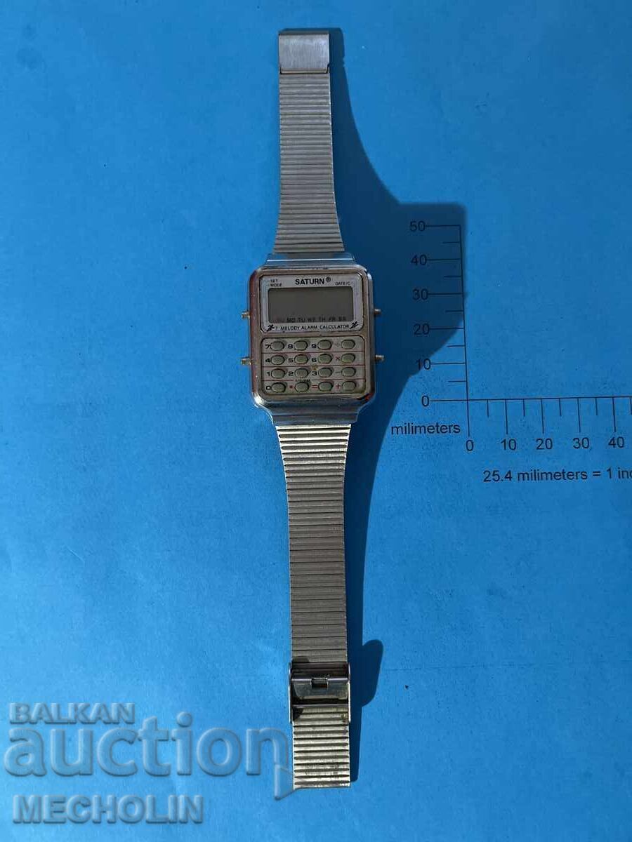 Auction Saturn 20 Calculator Watch Auction Saturn 20 Calculator Watch