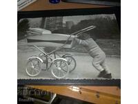 Old photo - Retro baby stroller