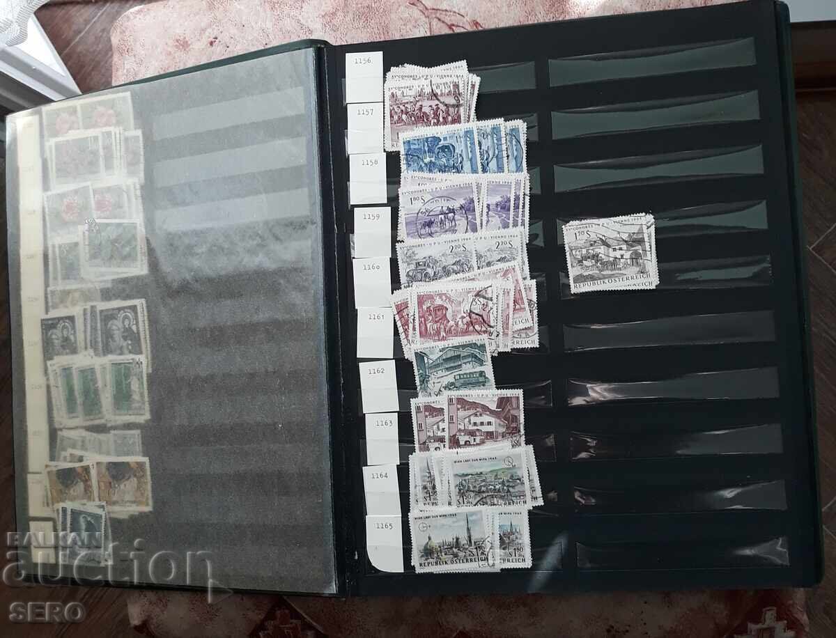 Livrarea Filatelie - clasor cu 12 foi și presupun că vreo 300 de timbre poștale Livrarea Filatelie - clasor cu 12 foi și presupun că vreo 300 de timbre poștale