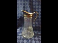 Cană de cristal cu ornamente metalice argintate