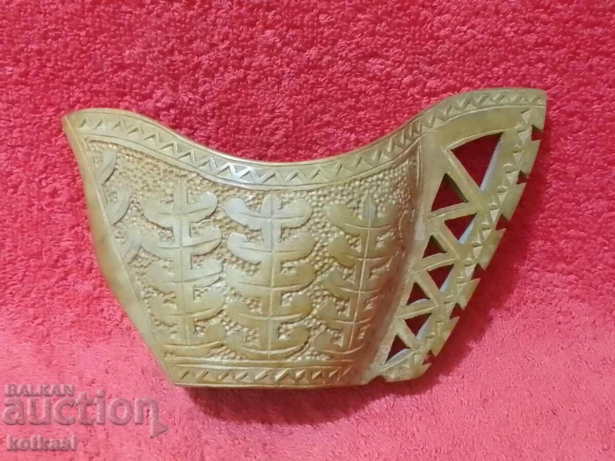 Wood carving Old cup from a single piece of wood
