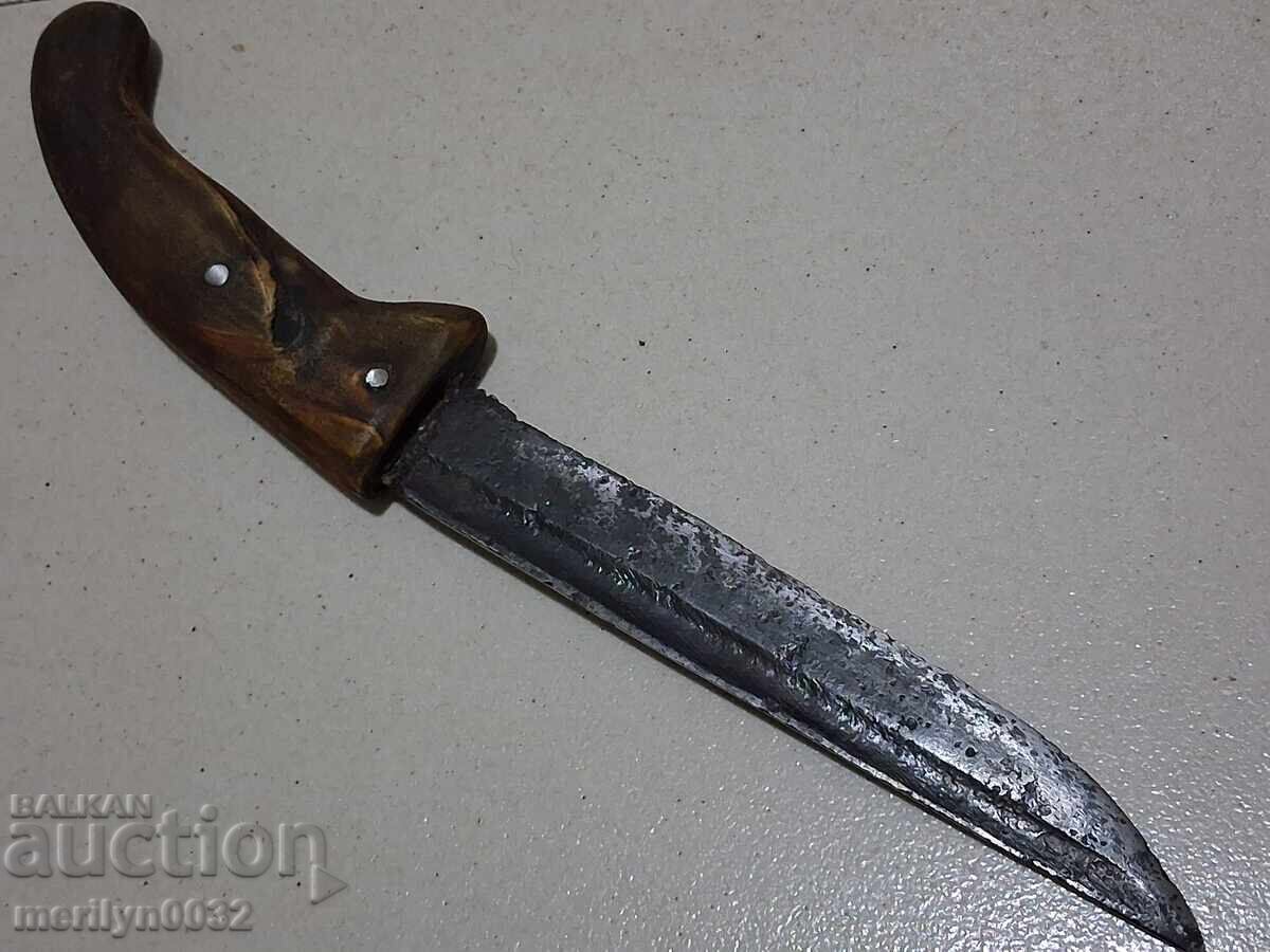 Old hand-forged knife without a sheath, buffalo horn handle, karakul (wool)
