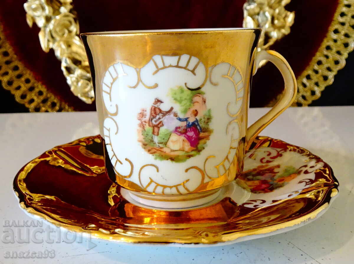 Italian porcelain cup with saucer, gold, Fragonard with price 12.00 BGN | € 6.14 Italian porcelain cup with saucer, gold, Fragonard with price 12.00 BGN | € 6.14