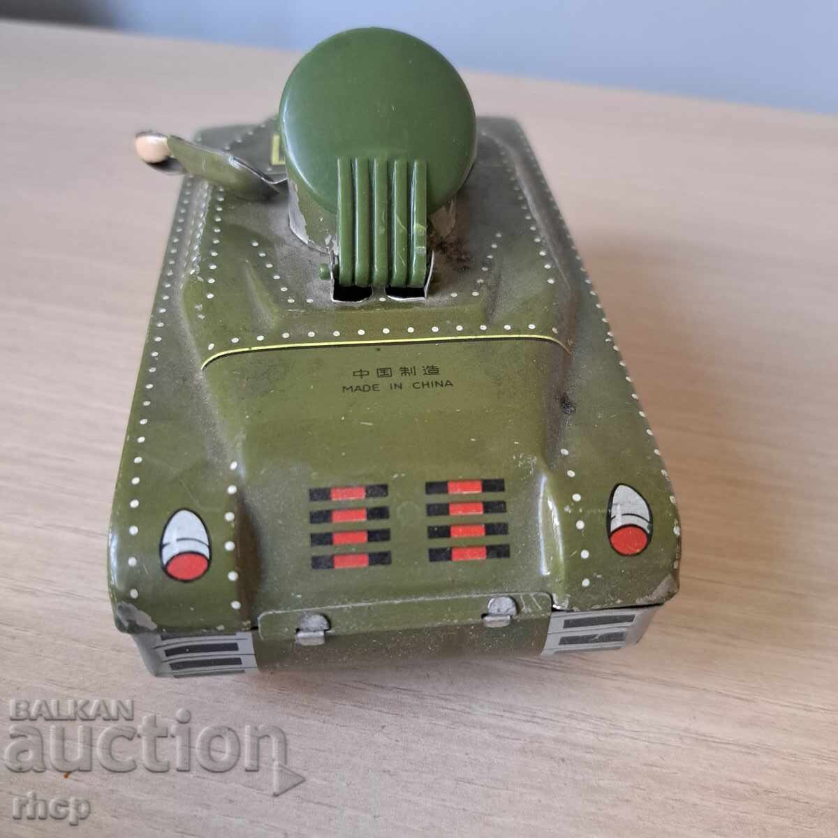 Delivery of Tank old tin toy Delivery of Tank old tin toy