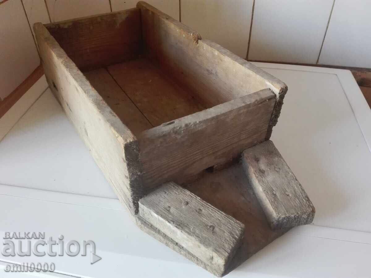 Old wooden cheese mold