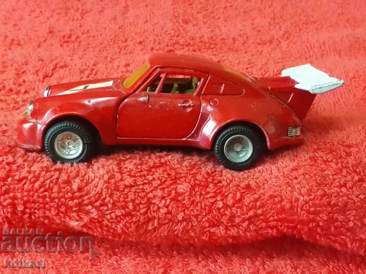 Auction  Old, massive metal car PORSCHE HONG KONG