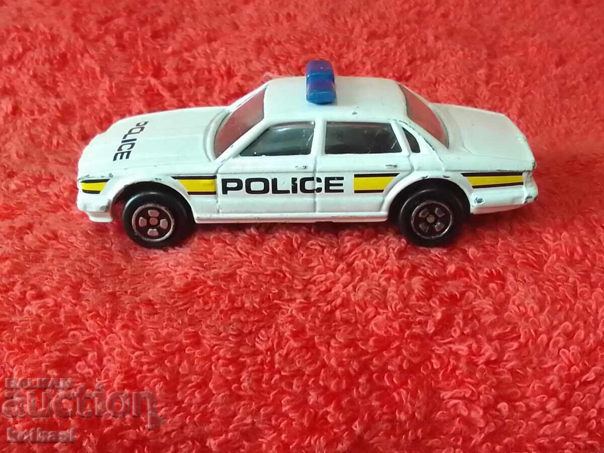 Auction  Old solid metal Corgi Police car