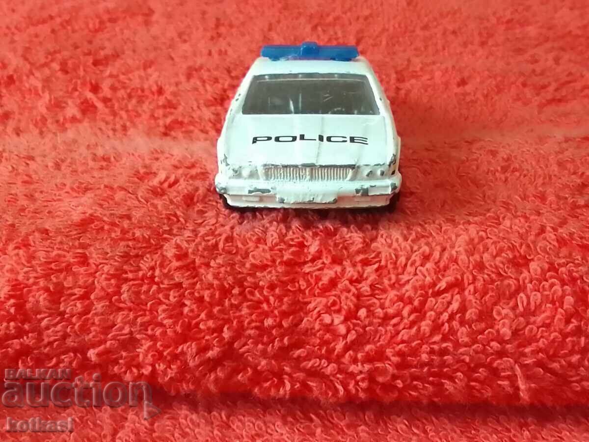 Delivery of Old solid metal Corgi Police car