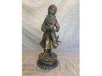 Figure statuette of a student