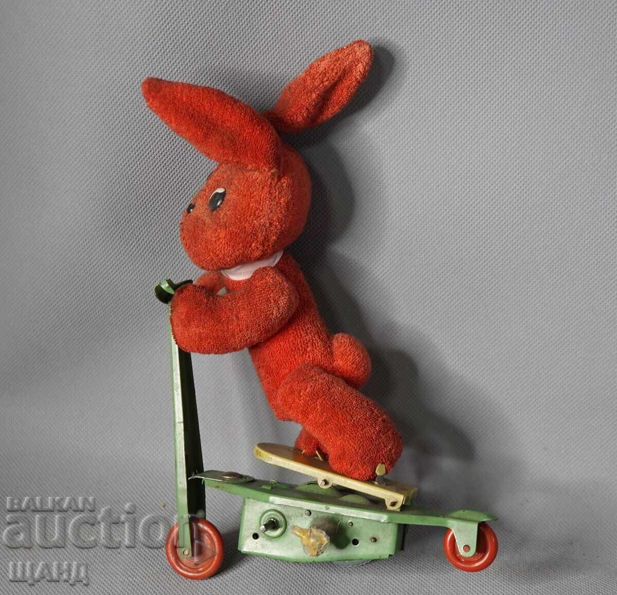 Old mechanical metal toy scooter model with rabbit with price 15.35 BGN | € 7.85 Old mechanical metal toy scooter model with rabbit with price 15.35 BGN | € 7.85