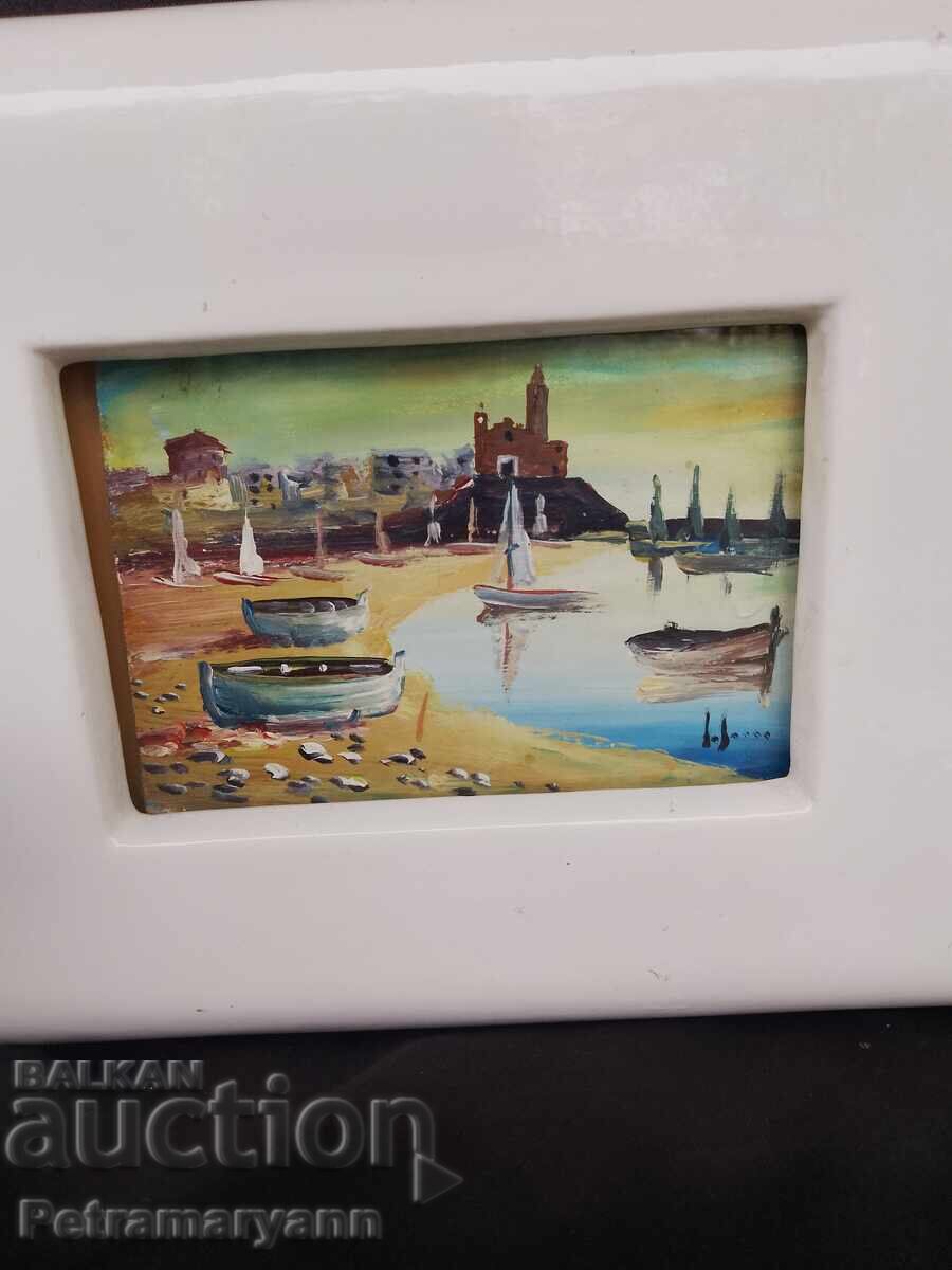 Seascape painting in a porcelain frame
