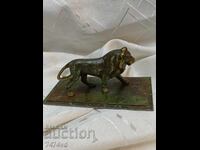 Massive small bronze sculpture of a lion with dimensions 12/6/6 cm