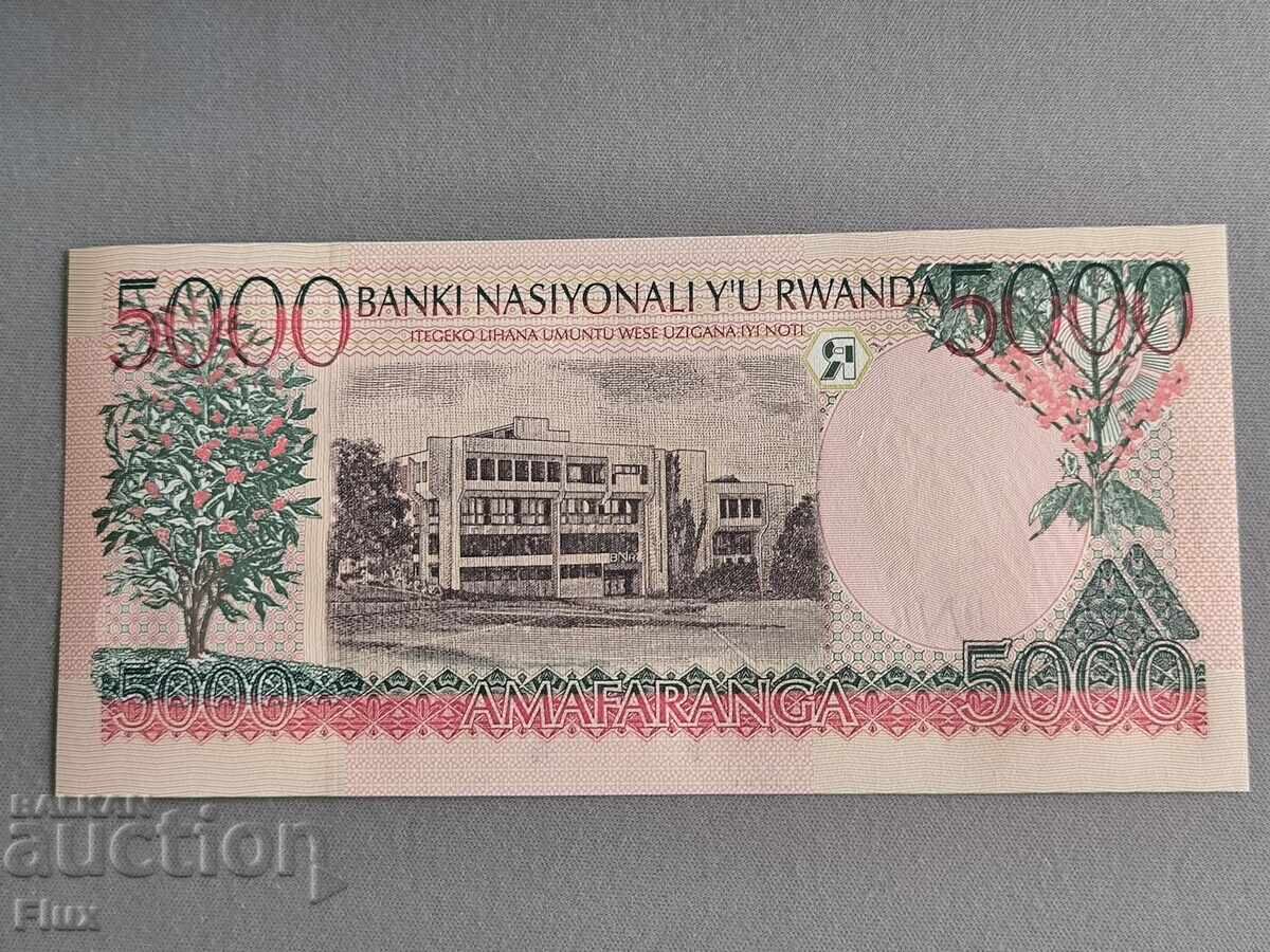Bancnotă - Ruanda - 5000 franci UNC | 1998 cu preț 12.00 BGN | € 6.14 Bancnotă - Ruanda - 5000 franci UNC | 1998 cu preț 12.00 BGN | € 6.14