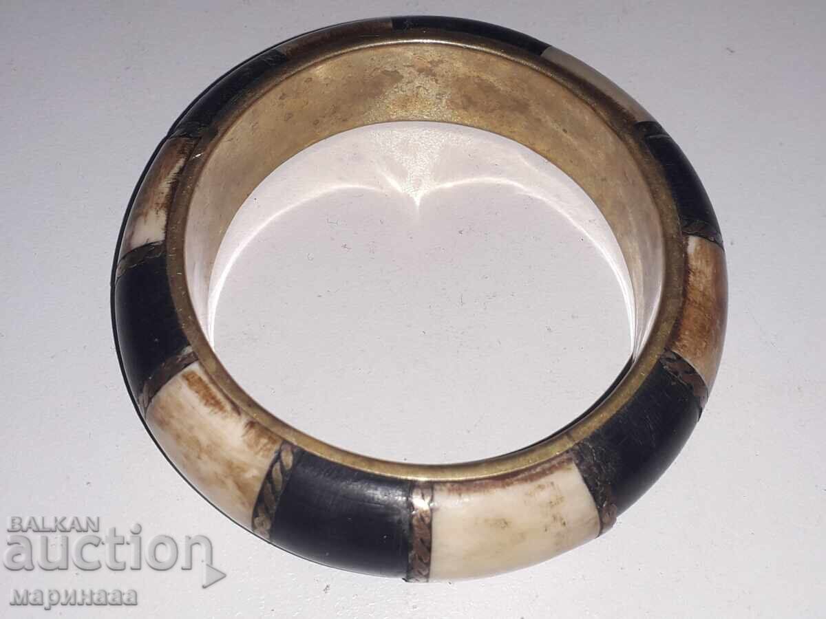 Auction  GRYVNA. Bone, Brass