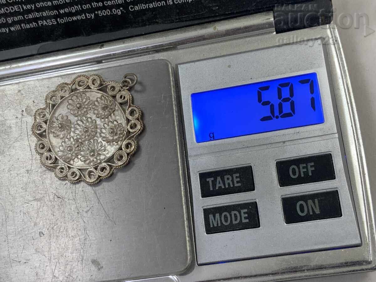 Delivery of Silver pendant Delivery of Silver pendant