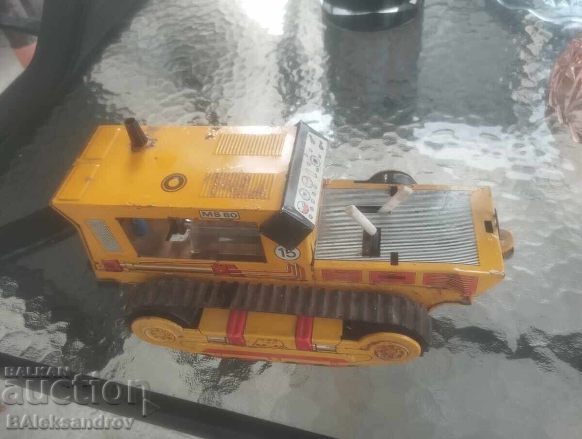 Old tin toy bulldozer Old tin toy bulldozer