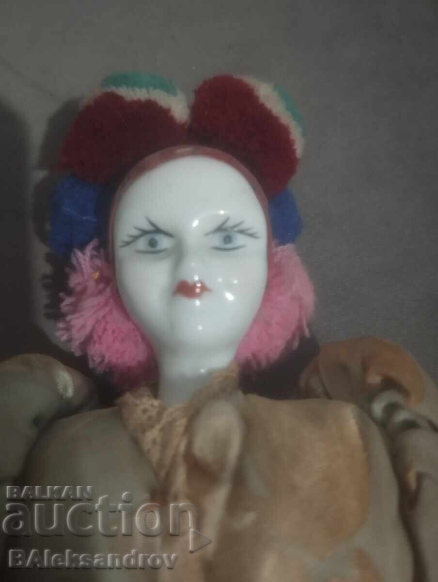 Old rag doll with a porcelain head with price 16.00 BGN | € 8.18 Old rag doll with a porcelain head with price 16.00 BGN | € 8.18
