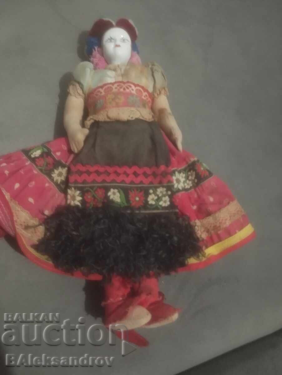 Auction Old rag doll with a porcelain head Auction Old rag doll with a porcelain head