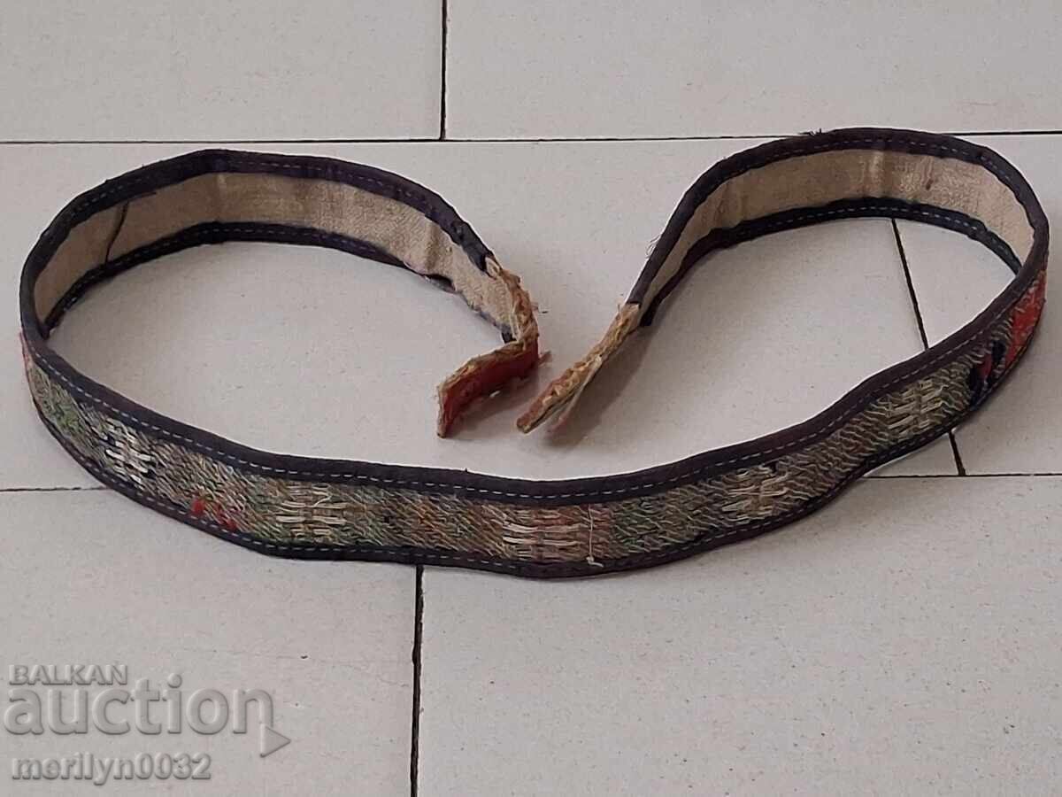 Old hand-knitted leather belt for traditional costume buckles