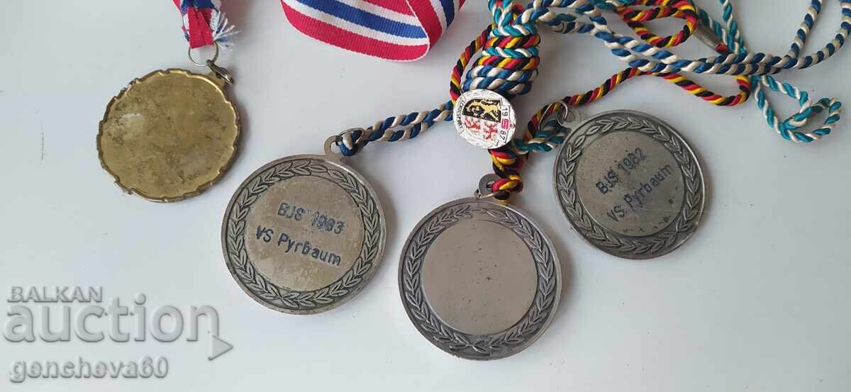 Auction  Old sports medals and badge