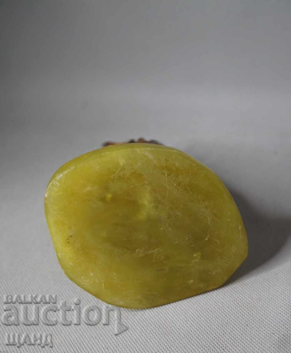 Delivery of Old figurine statuette bird on stone Delivery of Old figurine statuette bird on stone