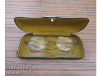 Old antique glasses with diopter and case